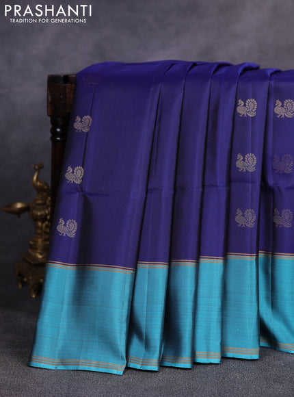 Pure soft silk saree navy blue and teal blue with allover zari woven buttas and rettapet zari woven border