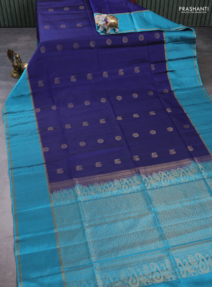 Pure soft silk saree navy blue and teal blue with allover zari woven buttas and rettapet zari woven border