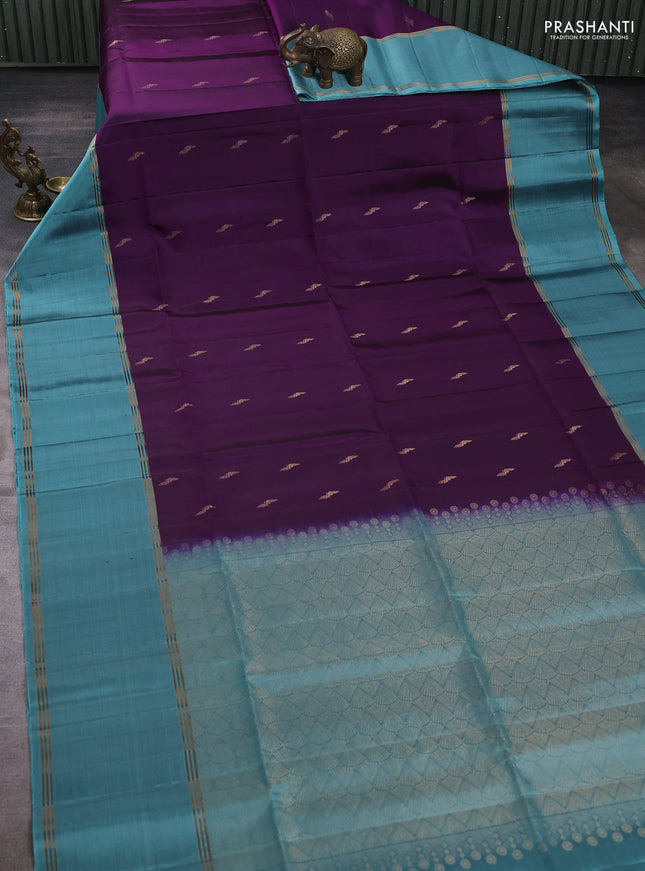 Pure soft silk saree deep purple and teal blue with allover zari woven buttas and rettapet zari woven border