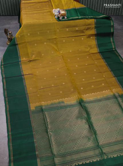Pure soft silk saree mustard green and green with allover zari woven buttas and rettapet zari woven border