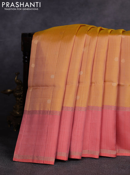 Pure soft silk saree yellow shade and orange with allover zari woven buttas and rettapet zari woven border