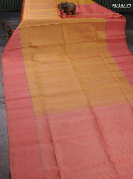 Pure soft silk saree yellow shade and orange with allover zari woven buttas and rettapet zari woven border