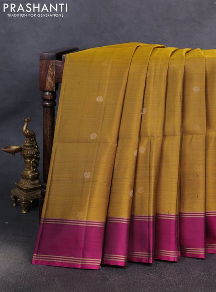 Pure soft silk saree mustard green and magenta pink with allover zari woven buttas and rettapet zari woven border