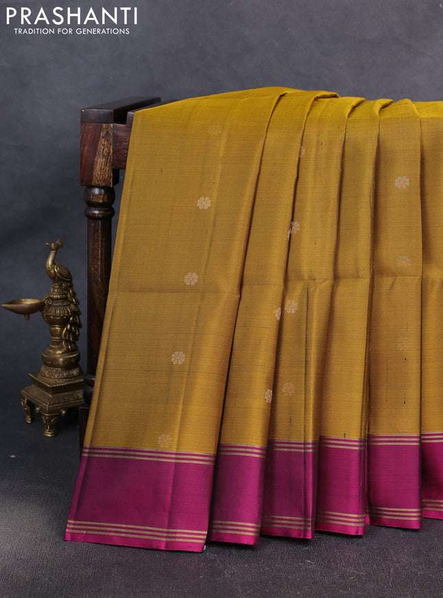 Pure soft silk saree mustard green and magenta pink with allover zari woven buttas and rettapet zari woven border