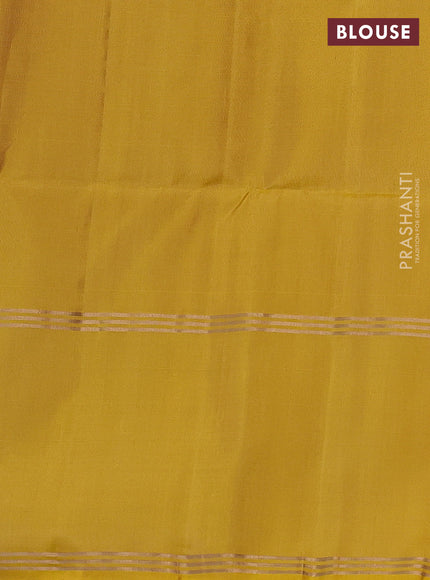 Pure soft silk saree beige and yellow with allover zari woven buttas and rettapet zari woven border