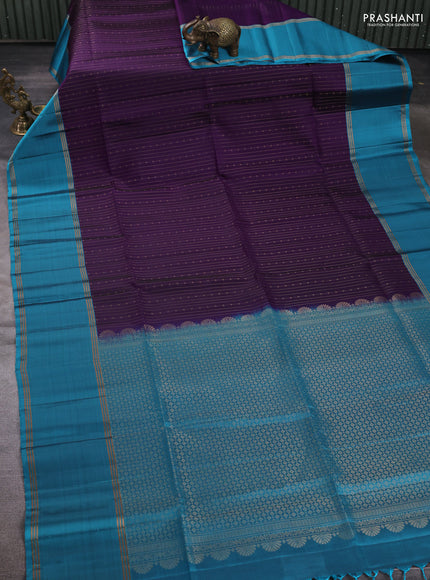 Pure soft silk saree violet and blue shade with allover zari woven buttas and rettapet zari woven border