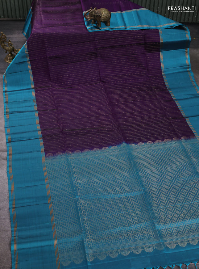 Pure soft silk saree violet and blue shade with allover zari woven buttas and rettapet zari woven border