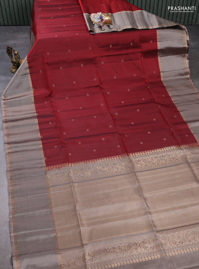 Pure soft silk saree maroon and beige with allover zari woven buttas and rettapet zari woven border