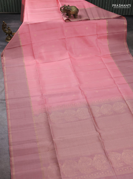 Pure soft silk saree peach shade and pastel peach with allover zari woven buttas and rettapet zari woven border
