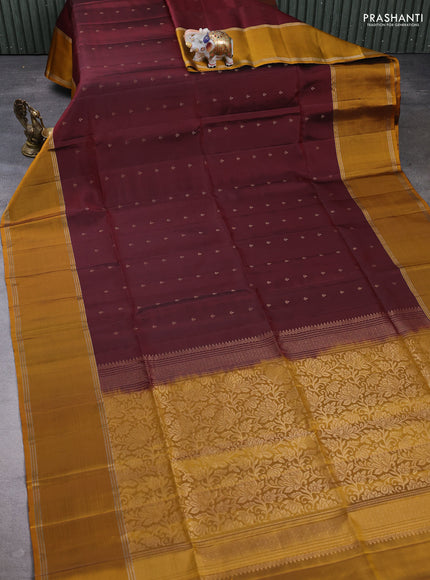 Pure soft silk saree deep wine shade and mustard yellow with allover zari woven buttas and rettapet zari woven border