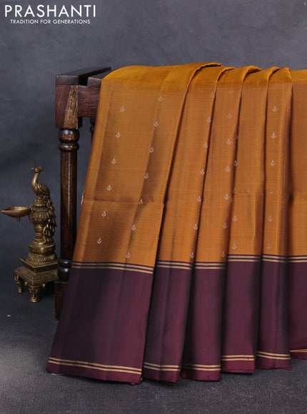Pure soft silk saree dark mustard and deep wine shade with allover zari woven buttas and rettapet zari woven border