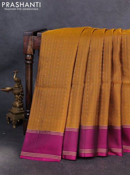 Pure soft silk saree dark mustard and magenta pink with allover zari weaves pattern and rettapet zari woven border
