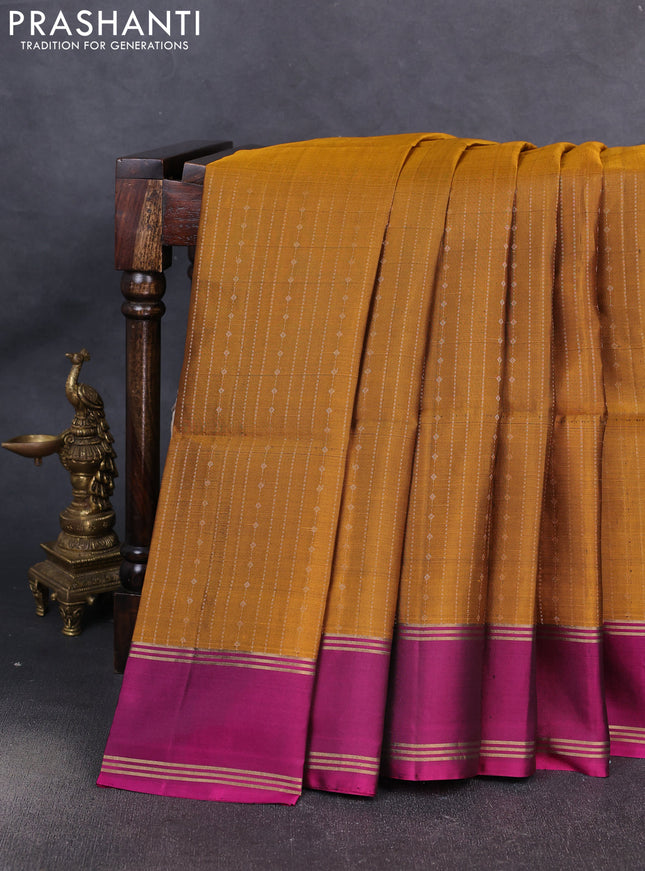 Pure soft silk saree dark mustard and magenta pink with allover zari weaves pattern and rettapet zari woven border