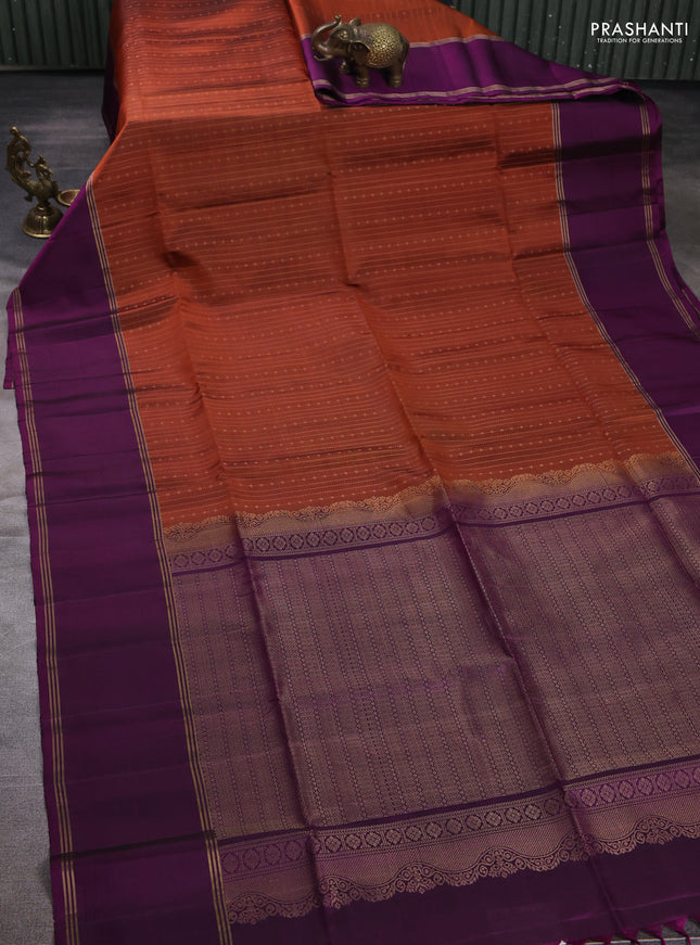 Pure soft silk saree rust shade and deep purple with allover zari weaves pattern and rettapet zari woven border