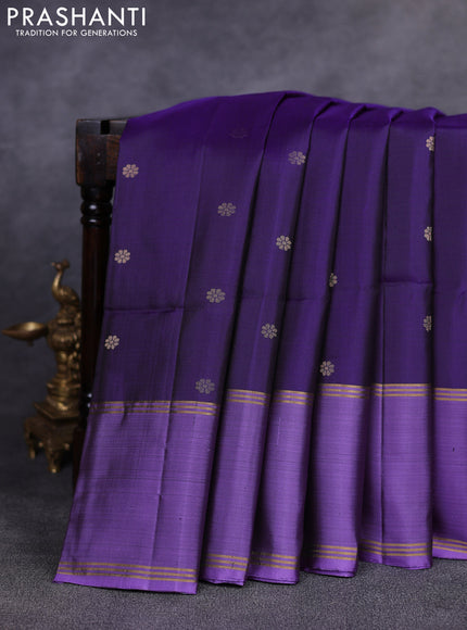 Pure soft silk saree violet and purple with allover zari woven buttas and rettapet zari woven border