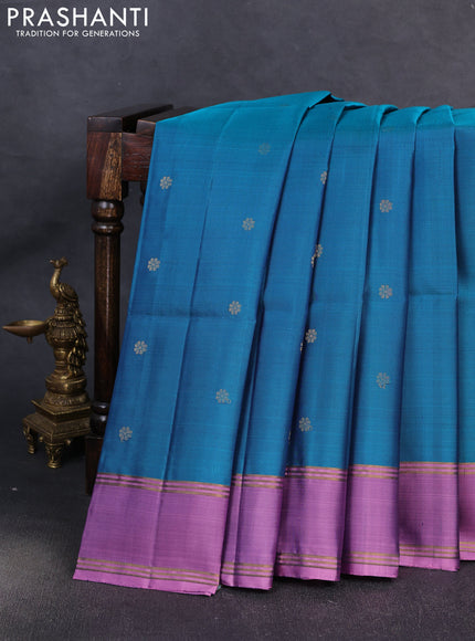 Pure soft silk saree teal blue and mauve pink with allover zari woven buttas and rettapet zari woven border
