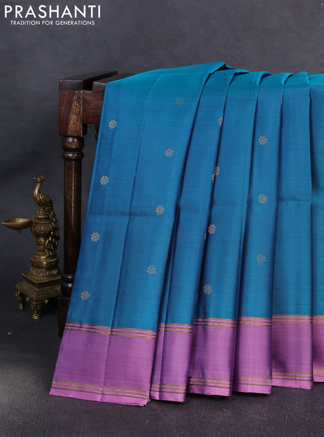 Pure soft silk saree teal blue and mauve pink with allover zari woven buttas and rettapet zari woven border