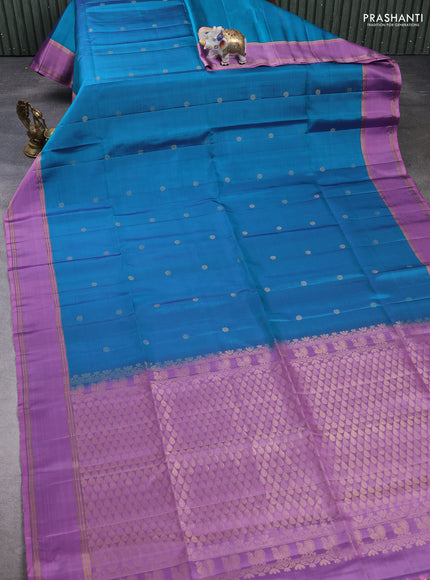 Pure soft silk saree teal blue and mauve pink with allover zari woven buttas and rettapet zari woven border