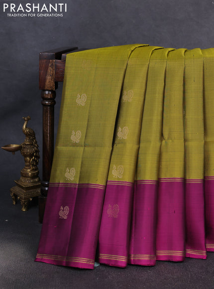 Pure soft silk saree mehendi green and magenta pink with allover zari woven buttas and rettapet zari woven butta border