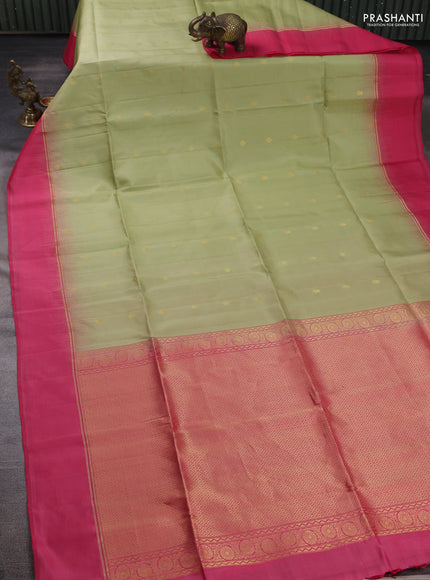 Pure soft silk saree pastel green and pink with allover zari woven buttas and zari woven simple border