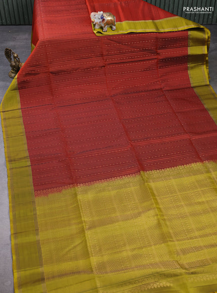 Pure soft silk saree rust shade and mustard green with allover zari weaves pattern and rettapet zari woven border
