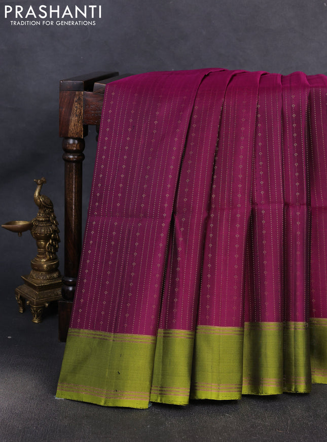 Pure soft silk saree deep magenta and light green with allover zari weaves pattern and rettapet zari woven border