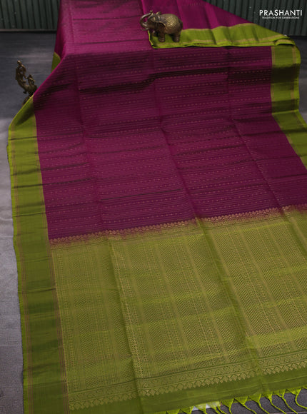Pure soft silk saree deep magenta and light green with allover zari weaves pattern and rettapet zari woven border