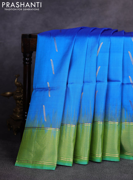 Pure soft silk saree cs blue and light green with allover zari woven buttas and zari woven border