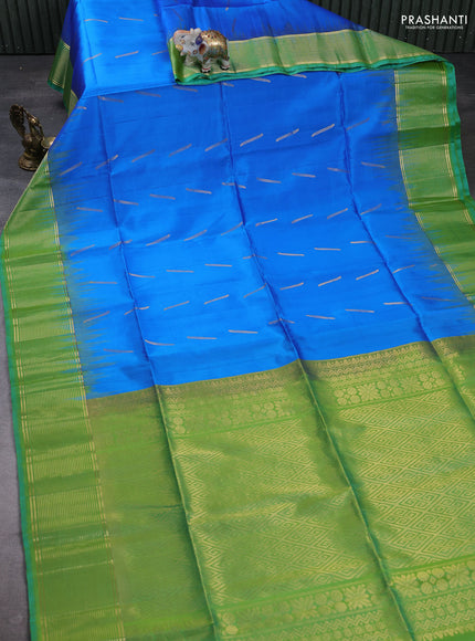 Pure soft silk saree cs blue and light green with allover zari woven buttas and zari woven border