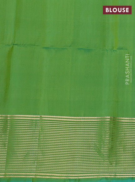 Pure soft silk saree cs blue and light green with allover zari woven buttas and zari woven border