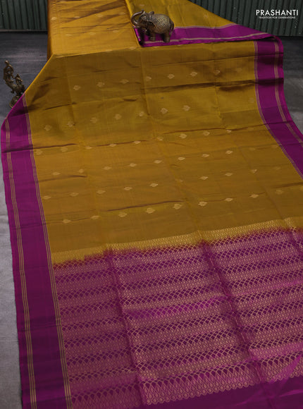 Pure soft silk saree mustard green and magenta pink with allover zari woven buttas and rettapet zari woven border