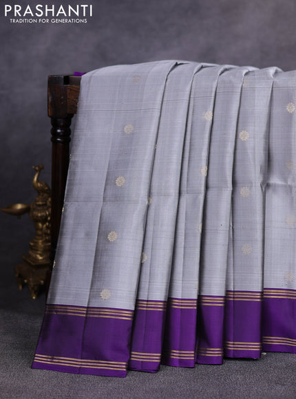 Pure soft silk saree grey and violet with allover zari woven buttas and rettapet zari woven border