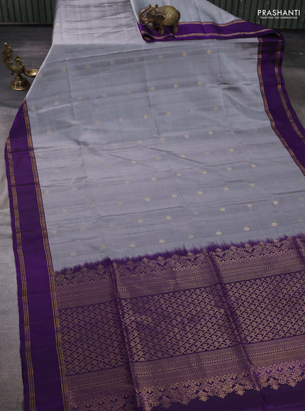 Pure soft silk saree grey and violet with allover zari woven buttas and rettapet zari woven border