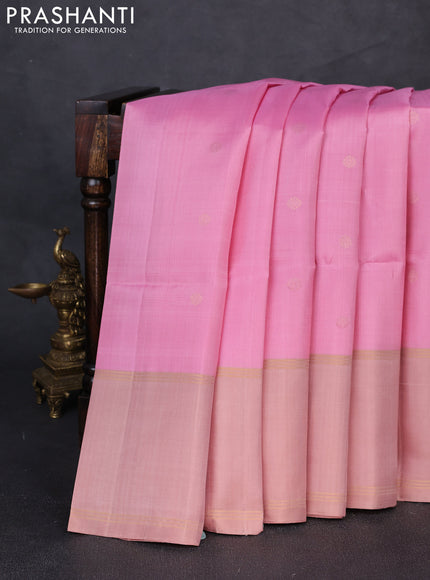 Pure soft silk saree light pink and sandal with allover zari woven buttas and rettapet zari woven border