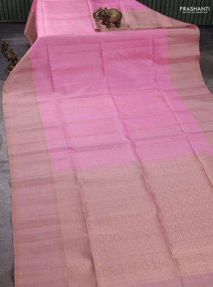 Pure soft silk saree light pink and sandal with allover zari woven buttas and rettapet zari woven border