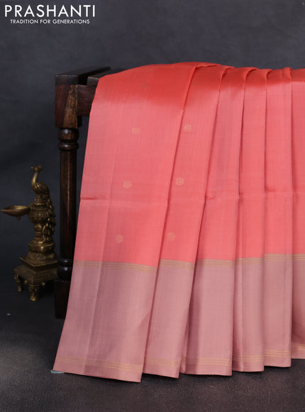 Pure soft silk saree peach shade and pastel peach with allover zari woven buttas and zari woven simple border
