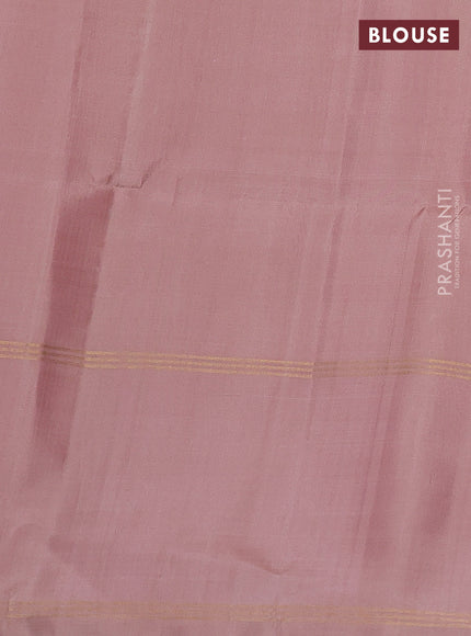 Pure soft silk saree peach shade and pastel peach with allover zari woven buttas and zari woven simple border