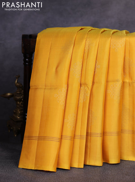 Pure soft silk saree yellow and purple with allover zari woven buttas and zari woven simple border