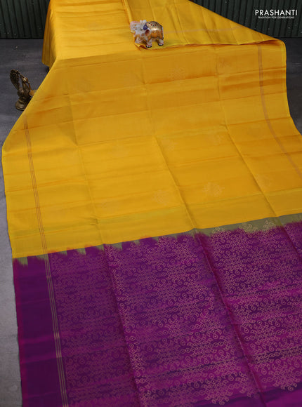 Pure soft silk saree yellow and purple with allover zari woven buttas and zari woven simple border