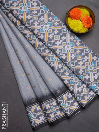 Art kota saree pastel grey and dark grey with allover zari woven buttas and temple design ikat printed border