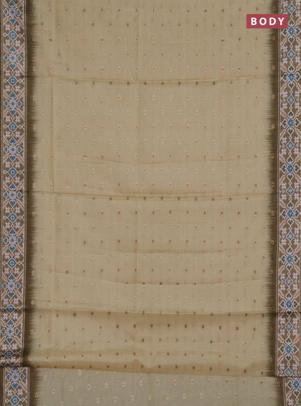 Art kota saree pale yellow and mehendi green with allover zari woven buttas and temple design ikat printed border