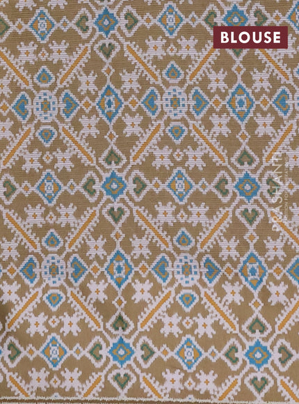 Art kota saree pale yellow and mehendi green with allover zari woven buttas and temple design ikat printed border