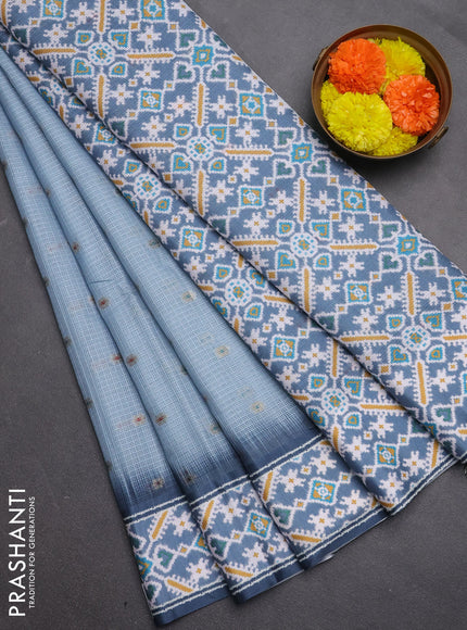 Art kota saree pastel blue and grey with allover zari woven buttas and temple design ikat printed border