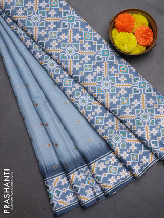 Art kota saree pastel blue and grey with allover zari woven buttas and temple design ikat printed border