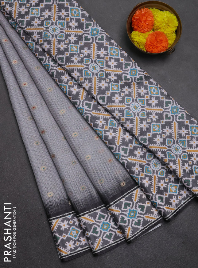 Art kota saree grey and black with allover zari woven buttas and temple design ikat printed border