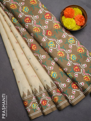 Art kota saree pale yellow and mehendi green with allover zari woven buttas and temple design ikat printed border