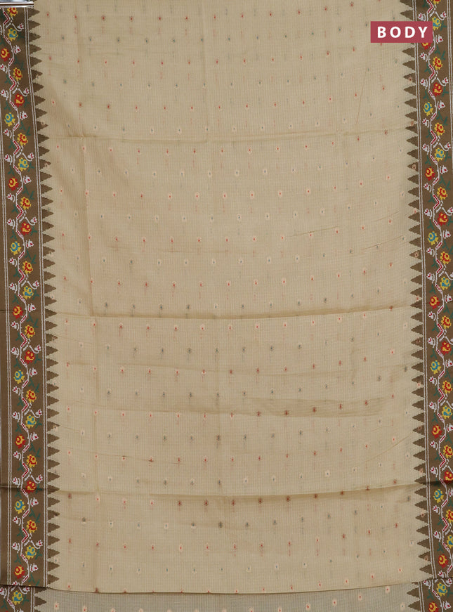 Art kota saree pale yellow and mehendi green with allover zari woven buttas and temple design ikat printed border