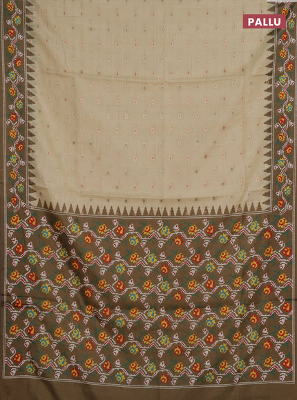 Art kota saree pale yellow and mehendi green with allover zari woven buttas and temple design ikat printed border