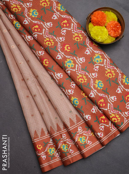 Art kota saree pastel orange and rustic orange with allover zari woven buttas and temple design ikat printed border