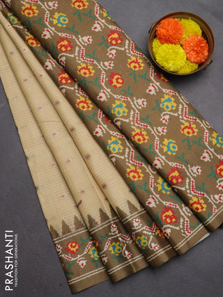 Art kota saree pale yellow and mehendi green with allover zari woven buttas and temple design ikat printed border